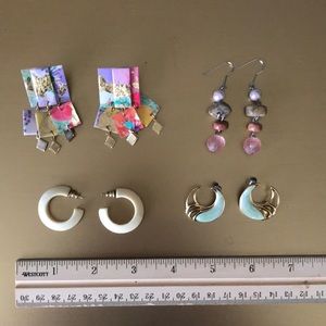 Four pairs of vintage earrings